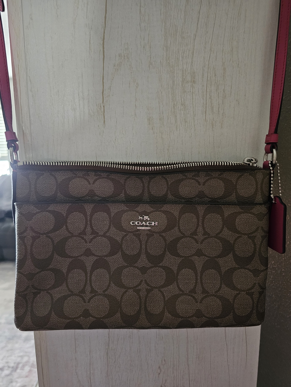 COACH Signature Canvas Brown Crossbody with Pink Strap